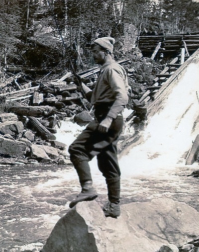 Tom Thomson fishing on the Oxtongue River